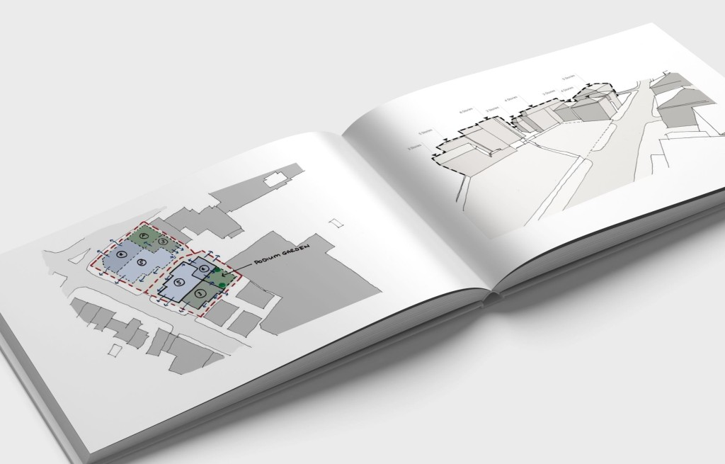 Open book displaying architectural feasibility study and site plans, illustrating the initial design concepts and spatial analysis for a development project.