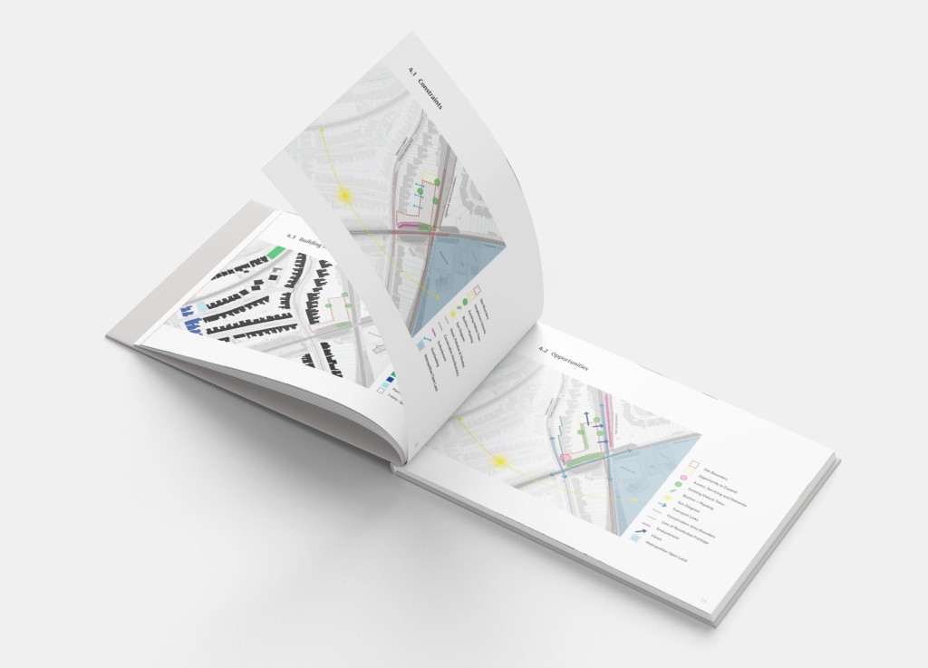 Open planning appraisal booklet showing detailed maps and diagrams, highlighting constraints and opportunities for urban development projects.