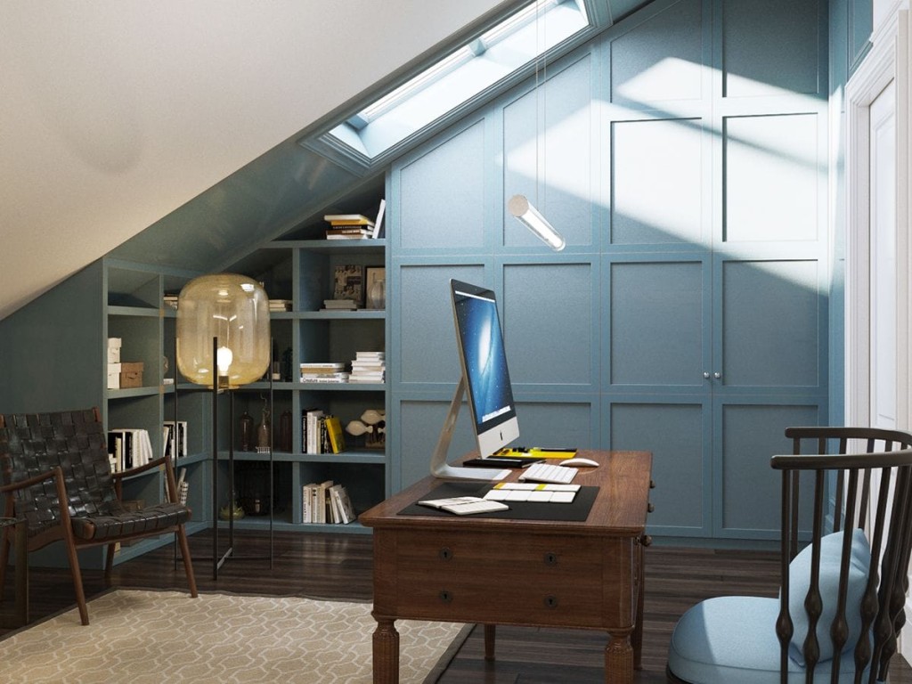 Stylish home office designed by a top London interior designer, featuring built-in blue cabinetry, a skylight for natural light, a vintage wooden desk, and modern seating.