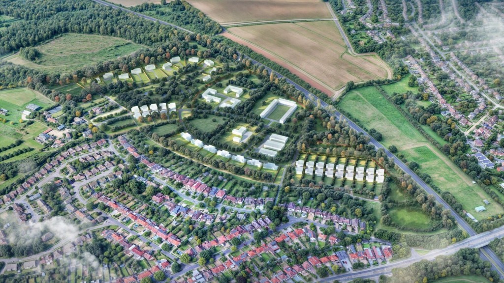 Aerial view of a master-planned development, showcasing a blend of residential and green spaces integrated into a suburban landscape. This image highlights the key elements of a successful masterplan, including sustainable urban design, efficient land use, and well-planned infrastructure that complements existing neighbourhoods. The arrangement of modern housing units amid tree-lined streets and open green areas exemplifies strategic planning aligned with local and national housing targets, as well as environmental considerations. Ideal for illustrating land promotion through the "call for sites" process.