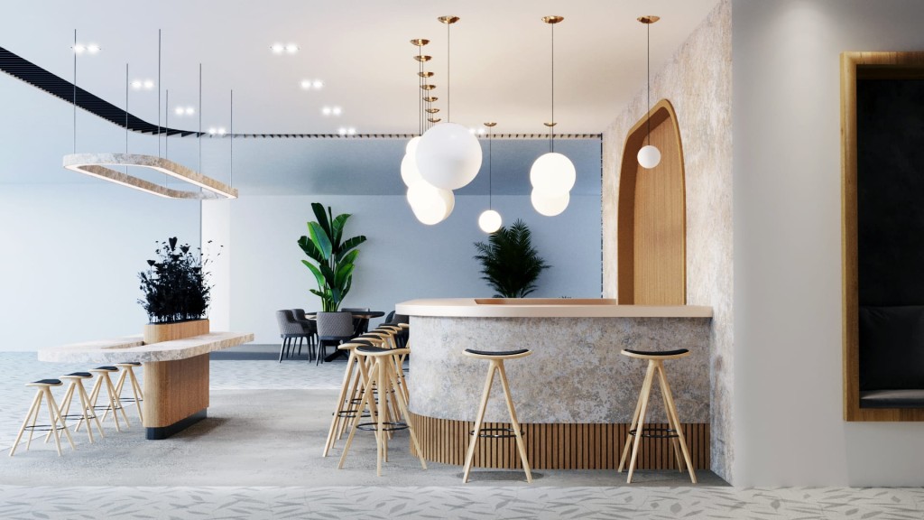 Chic and spacious lounge area with a modern marble bar counter, eclectic hanging lights, designer stools, and indoor greenery, reflecting a blend of natural elements with contemporary design.