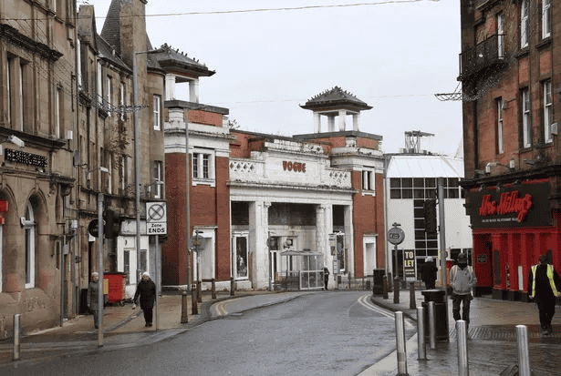 Street view of former Vogue bingo hall and cinema in Hamilton with beautiful red and white brick facade to be converted into residential flats in the historic character of the Hamilton Conservation Area