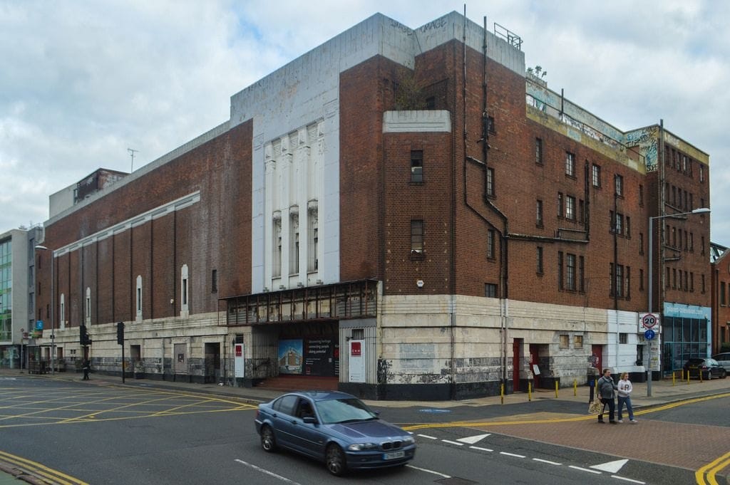 Street view on a cloudy day of the former Gala Bingo Hall ion Richmond Road in Kingston-upon-Thames on the corner plot of a busy street due to be partly rebuilt and converted into apartments and commercial units