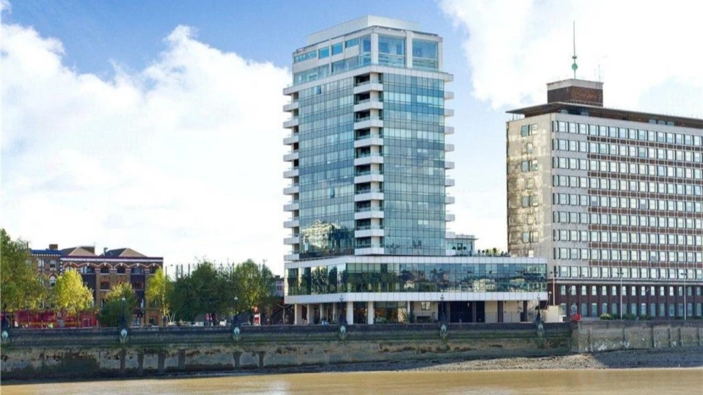 Modern riverside apartment building at Peninsula Heights, Albert Embankment, London, where a High Court case on flat amalgamation involved merging two adjacent flats into a single dwelling.