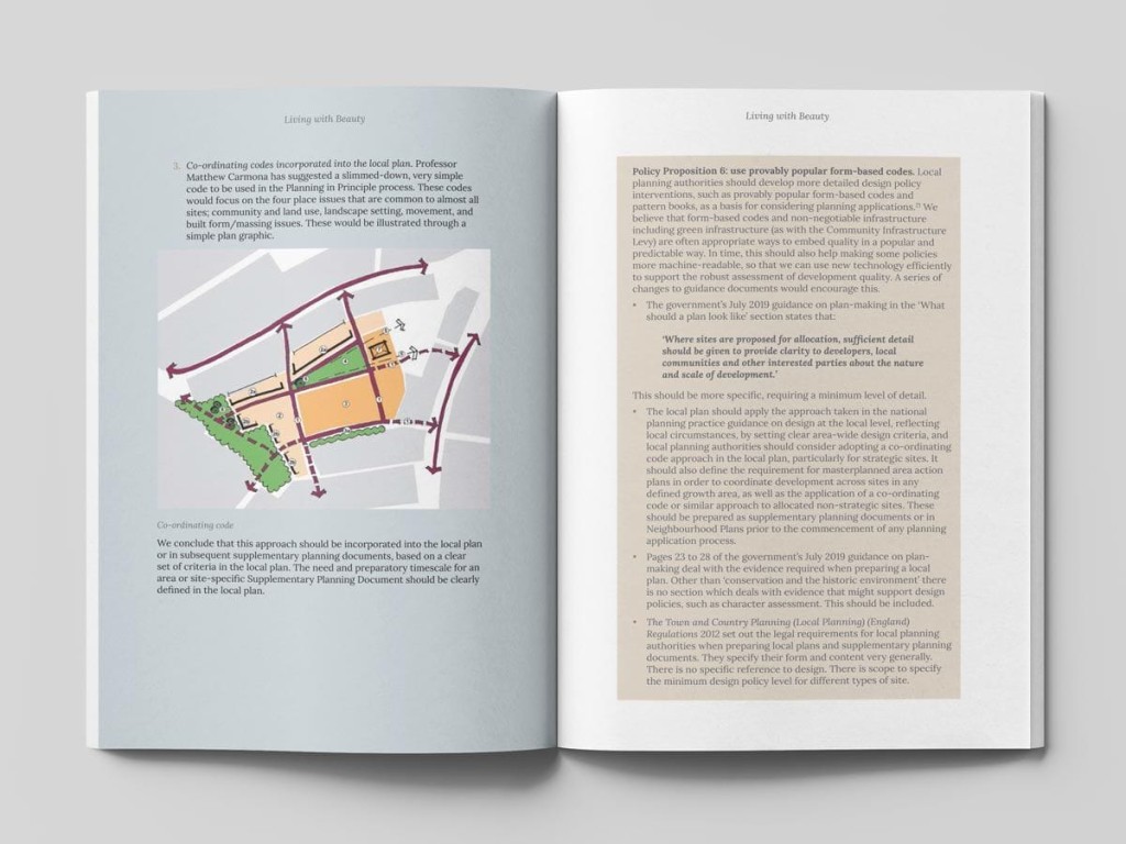 Open book displaying a page from 'Living with Beauty' report with text discussing policy propositions on form-based codes and a colorful graphic illustrating community land use, set against a light grey background.