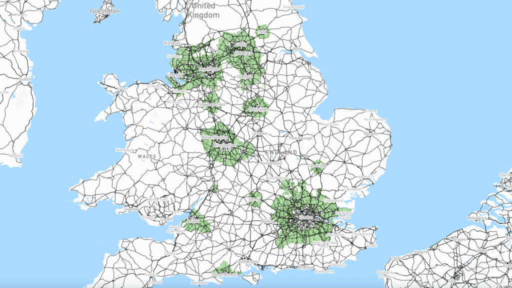 Map of the United Kingdom showing Green Belt designated areas in green overlay, highlighting the regions around major cities like London, Manchester, and Birmingham, based on the National Planning Policy Framework.
