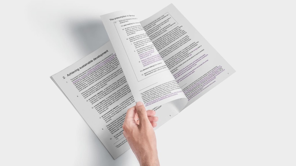 A close-up image of a hand turning the pages of a document titled 'Achieving Sustainable Development.' The focus is on the text, which discusses key policies within the National Planning Policy Framework (NPPF), including the presumption in favor of sustainable development. This image is relevant for those interested in urban planning, sustainable development, and the latest Green Belt planning policy updates.