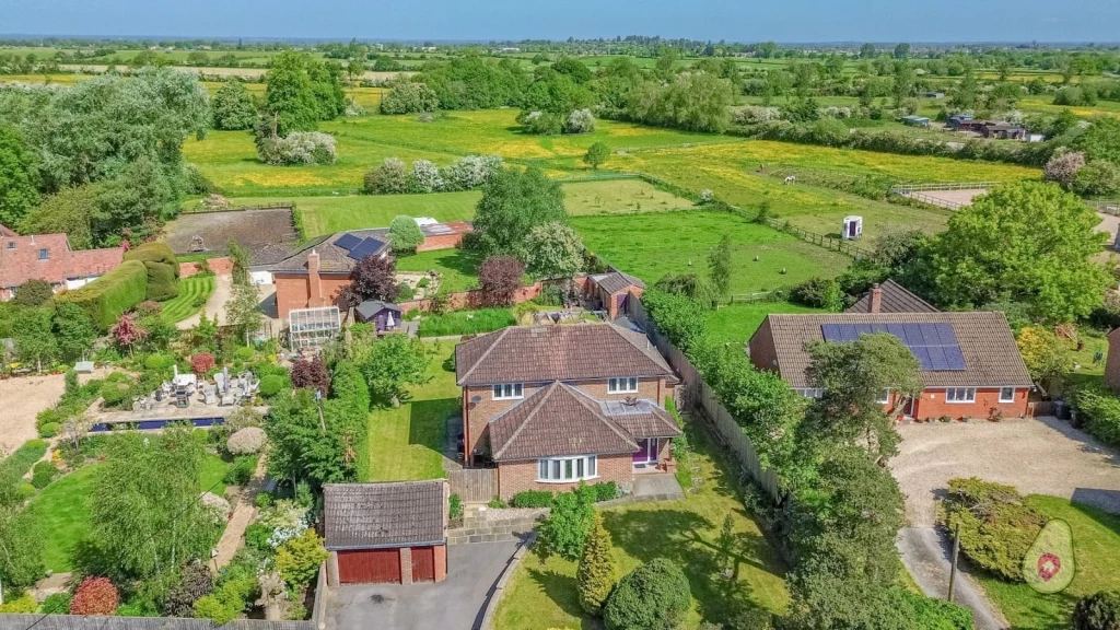 Aerial view of a property granted planning consent in the Green Belt due to very special circumstances related to health and personal situations.