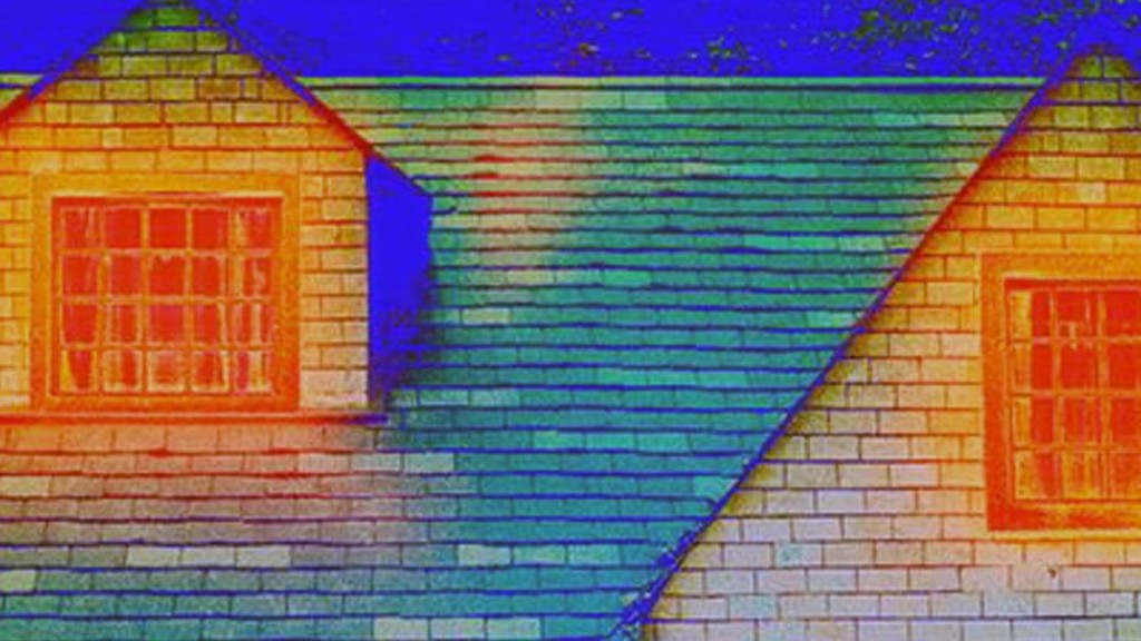 Thermal image of a house roof and dormer window, showing areas of heat loss and insulation performance. The image highlights the importance of proper insulation and airtight construction in eco, Passivhaus, and zero-carbon houses to improve energy efficiency and reduce heating and cooling costs.