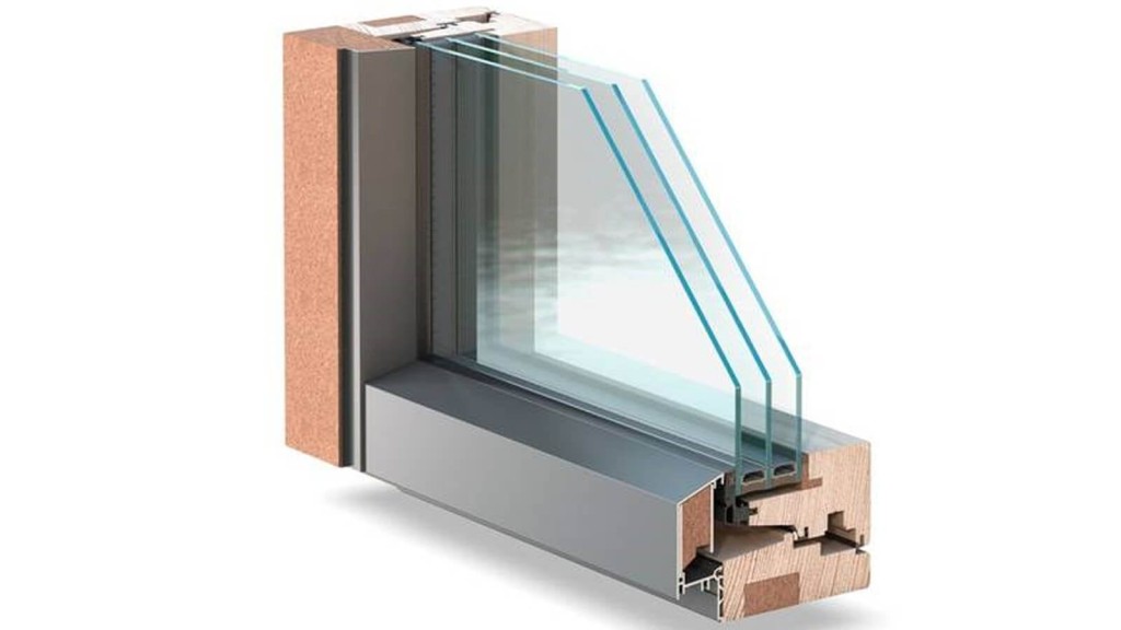 Cross-sectional view of a high-performance triple-glazed window, showcasing advanced glazing technology used in eco, Passivhaus, and zero-carbon houses. The image highlights the importance of energy-efficient windows in reducing heat loss and improving thermal insulation for sustainable building design.