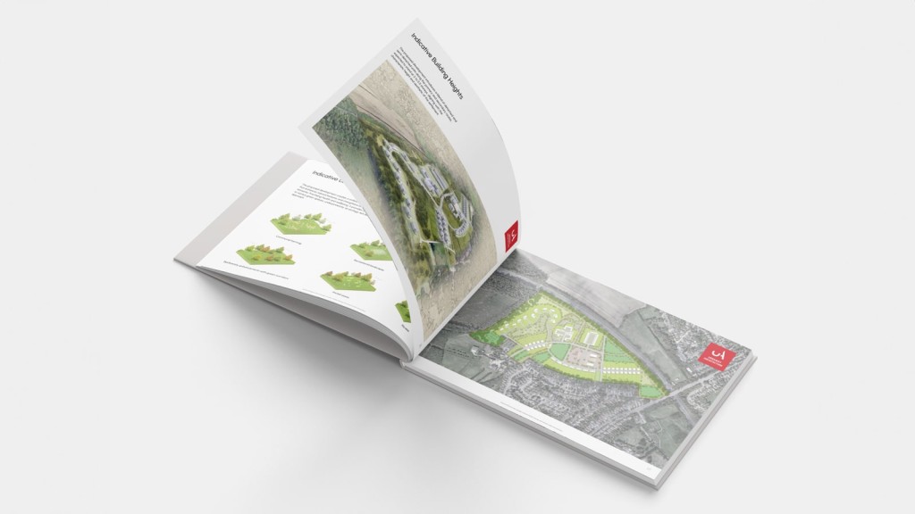 Open brochure on a white surface displaying a masterplan of a proposed housing development within a Green Belt area, with aerial view illustrations and landscaping design layouts, highlighting the detailed planning required for obtaining Green Belt planning permission.