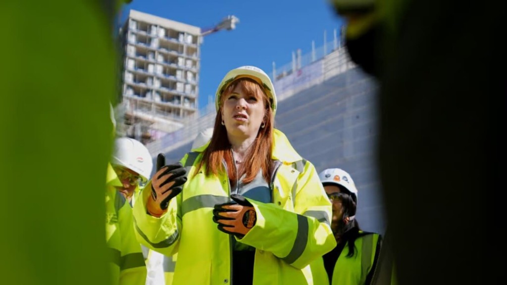 A site visit to a high-rise construction project symbolises the drive for affordable housing one year on with Labour in charge, as reforms and the Grey Belt policy aim to accelerate delivery.