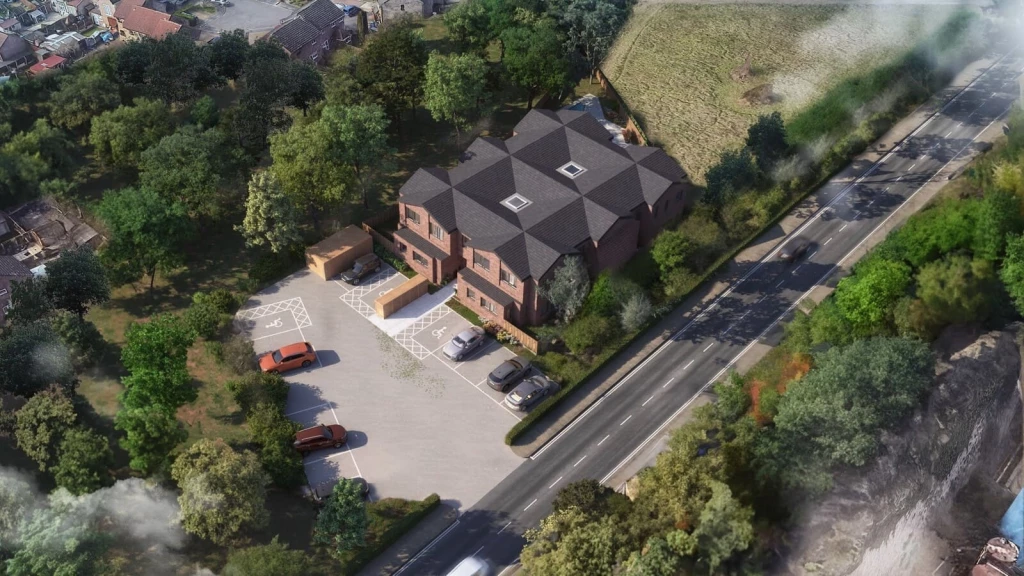 A Google Earth-style aerial scene showing a greenfield edge-of-settlement location featuring a CGI-rendered block of new-build flats among established trees.