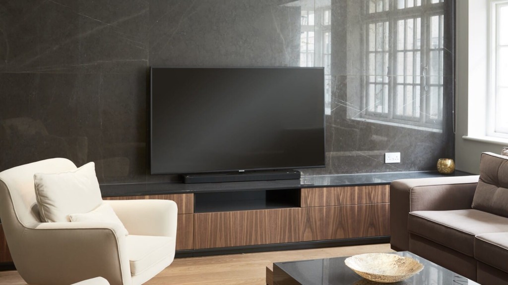 Bespoke contemporary living room in central London featuring a large flat-screen TV.