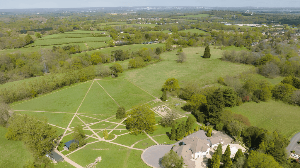 Aerial view of underused land within the Metropolitan Green Belt, showcasing areas considered for potential development under Green Belt reform aligned with the London Plan.
