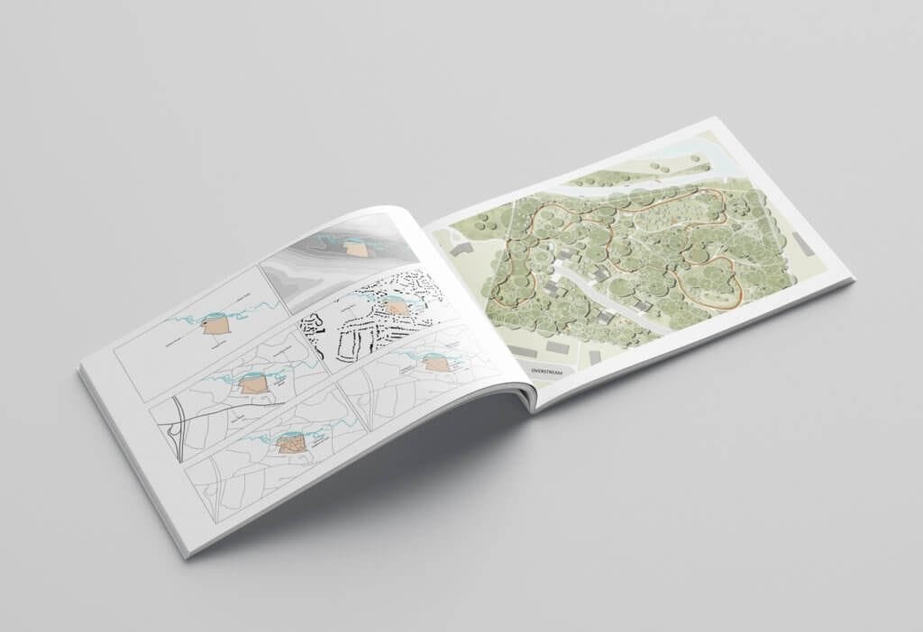 An open book showcasing detailed landscape and site planning illustrations. One page features comprehensive site layout with pathways, building plots, and greenery, while the opposite page contains maps showing the project's location and context. The book is placed on a gray background, emphasising the architectural planning and design elements.