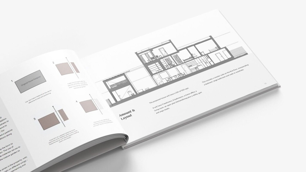 Open architectural design book displaying house floor plans and cross-section diagrams, laid on a white surface, illustrating detailed modern home construction concepts.