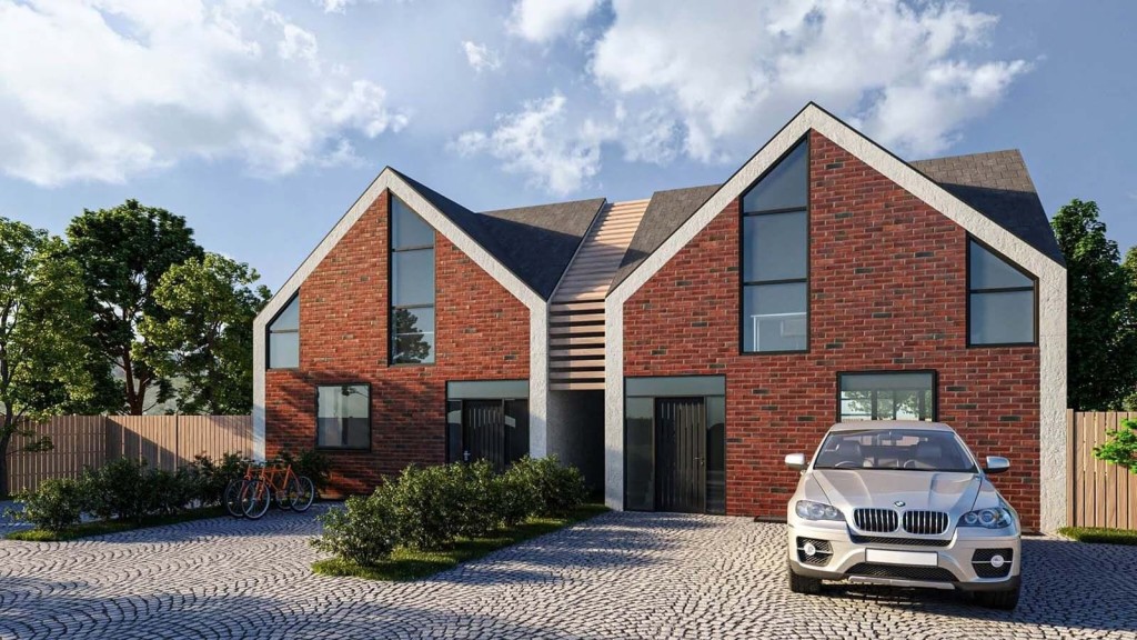 Two modern countryside brick houses featuring dual gabled roofs, large windows, and central stone-clad entryway, complemented by a cobblestone driveway with a parked luxury SUV and a pair of bicycles to the side, set against a backdrop of lush trees and a clear blue sky.