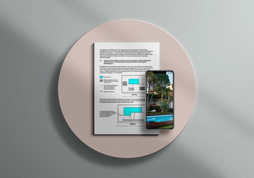 Elegant presentation of planning documents on a round pink table with a smartphone displaying a photo of a residential outdoor pool, highlighting the integration of digital and physical planning tools in modern landscape architecture.