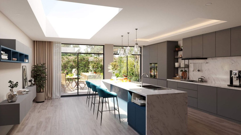 Modern kitchen extension with skylight, featuring marble island, teal bar stools, and a view to a lush garden through floor-to-ceiling windows.