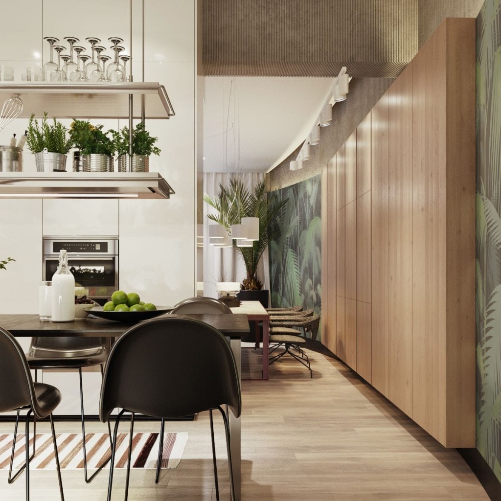 Modern kitchen and dining space with floating shelves displaying glassware, built-in stainless steel appliances, black dining chairs around a dark wood table, and a tropical wallpaper accent, embodying contemporary interior design trends.