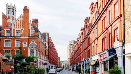 Historic red-brick buildings lining a street in Central London, reflecting the popular development projects for developers in this iconic city.