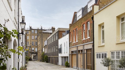 Quaint residential street in Central London showcasing traditional and contemporary homes, illustrating the popular architecture projects for homeowners in the city.