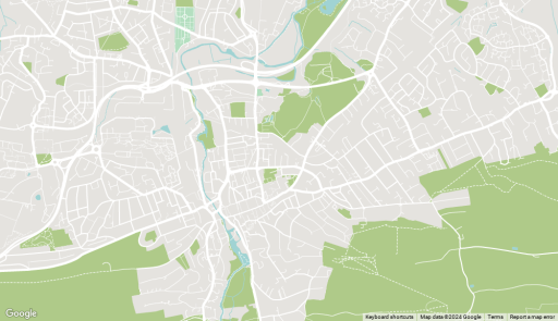Map of Guildford showing a network of streets and roads with surrounding green spaces and water bodies, including a river running through the city, for urban planning and architecture design reference.