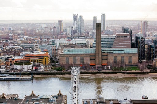 South aerial view of Millenium Bridge and Tate Morden with alongside the River Thames in the Borough of Southwark