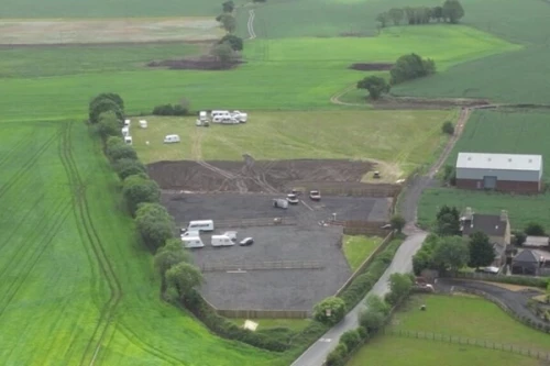 The Bank Holiday 'land grabs' making travellers 'millionaires' overnight: How beauty spots could be paved over and sold for huge profits after caravans move in