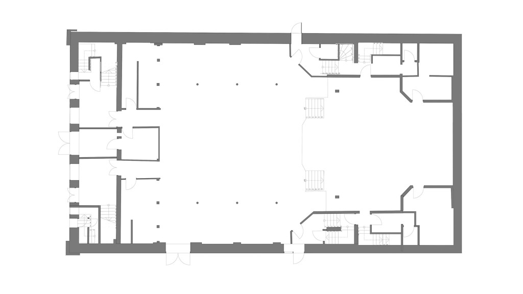 Existing first floor plan of the 1910 Workmens Institute in Abertridwr, Wales, showcasing the original architectural layout. This detailed architectural drawing provides a baseline for the planned conversion into modern flats, preserving the historical integrity while preparing for a contemporary residential redesign.