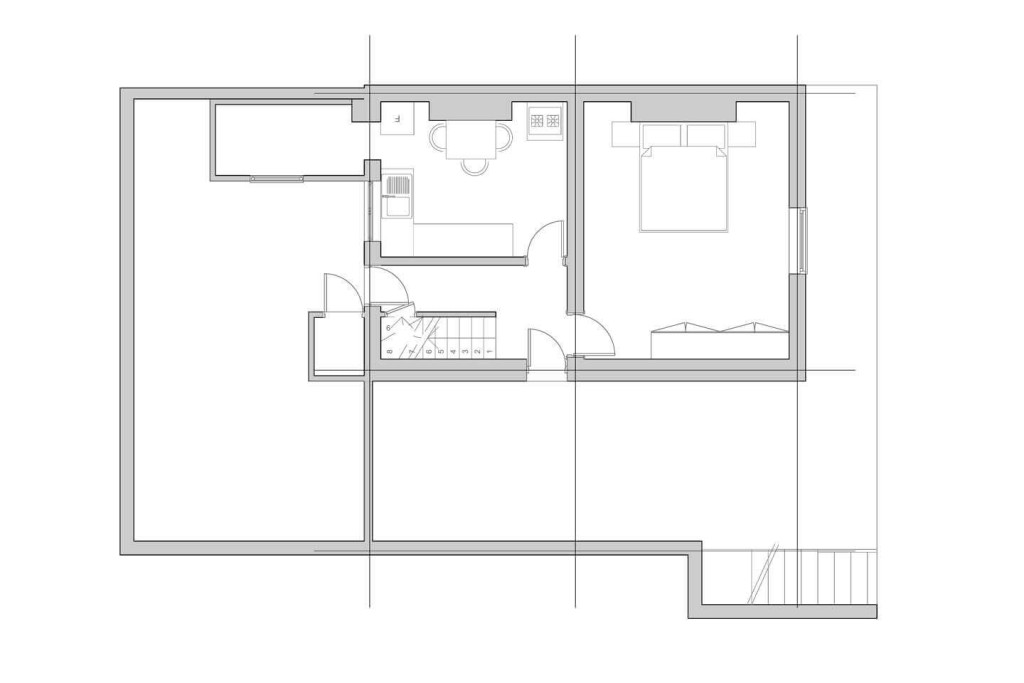 Architectural floor plan drawing of the existing ground floor for a flat conversion project showcasing a detailed layout with designated spaces for living room, kitchen, bedroom, and bathroom.