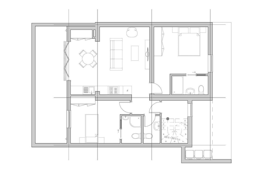 Planning architectural drawing of the proposed ground-floor for a three-flat conversion project, detailing the spatial arrangement and room layout including furniture placement and design elements.