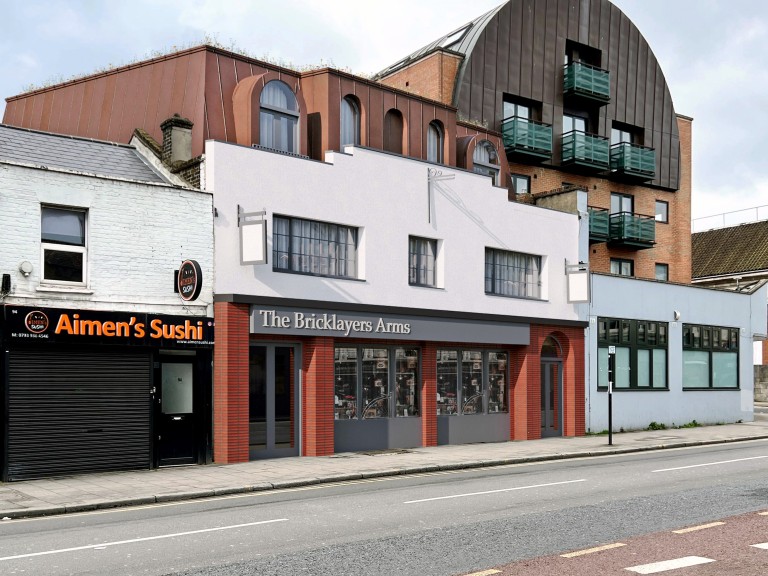 Street-level view of a diverse urban streetscape featuring 'Aimen's Sushi' restaurant, 'The Bricklayers Arms' pub with red brick accents, and a modern apartment building with distinctive arched roof design with front balconies.