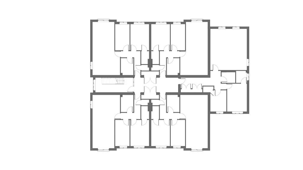 Floor plan of the existing first floor in a block of flats, showing the original layout before the upward extension added two new levels and seven additional flats.