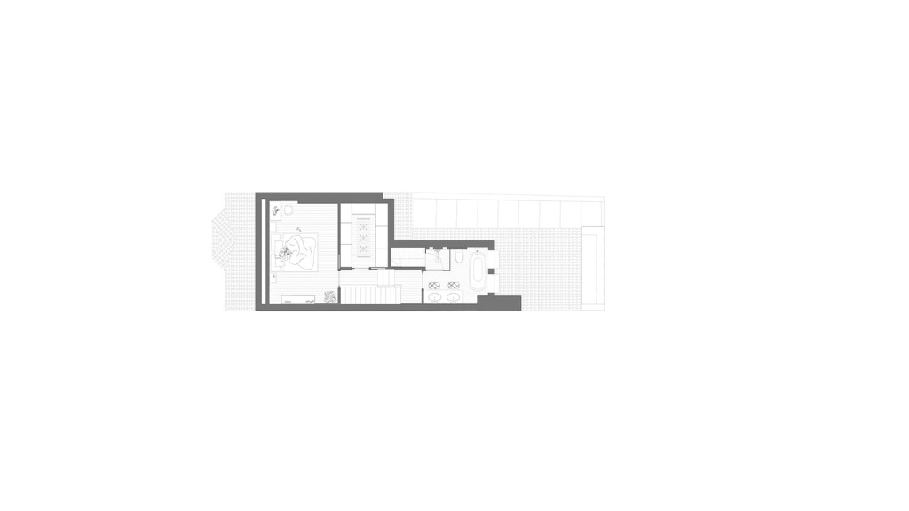 This architectural floor plan depicts the proposed loft floor layout for a property at Scawen Road SE8 5AG, as part of an urban wraparound extension project by Urbanist Architecture. The plan illustrates the redesigned loft space, featuring a bedroom, bathroom, and additional living areas. This design aims to optimise space utilisation, enhance functionality, and integrate modern elements while maintaining the property's original character.