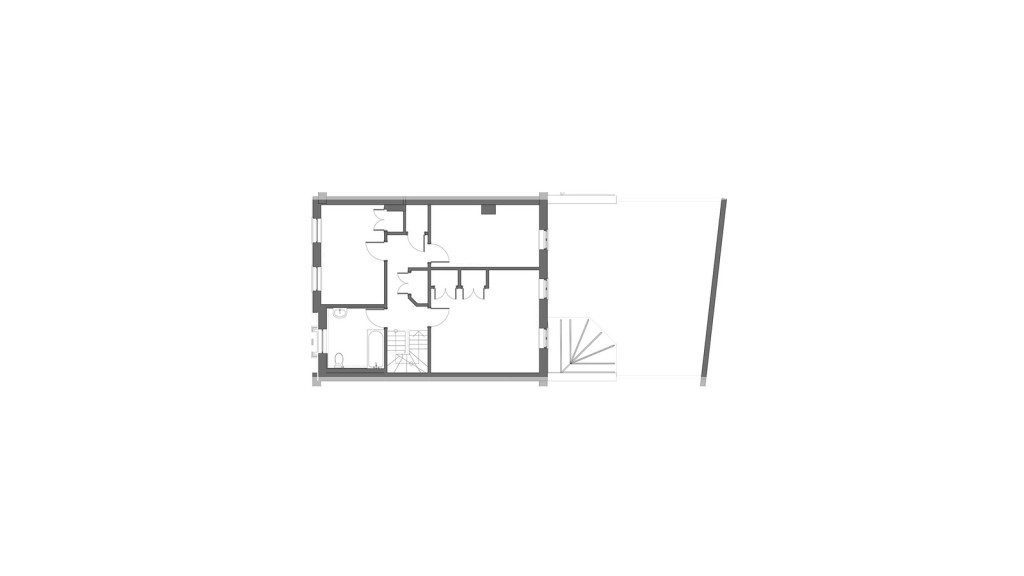 Existing first-floor layout plan of a residential property located within a conservation area in Greenwich. This architectural drawing illustrates the current spatial arrangement, including room divisions, stair placement, and overall flow of the space. The plan is crucial for understanding the starting point before proposed modifications or extensions, particularly in heritage-sensitive contexts where preserving the character of the building is essential.