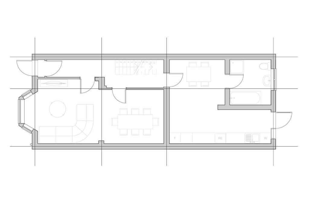 Architectural layout plans in a grey scale showcasing the existing ground floor of a Victorian terrace house which include a large and long living and formal dining area at the front of the property, a kitchen and breakfast table at the rear as well as a bathroom overlooking into the garden