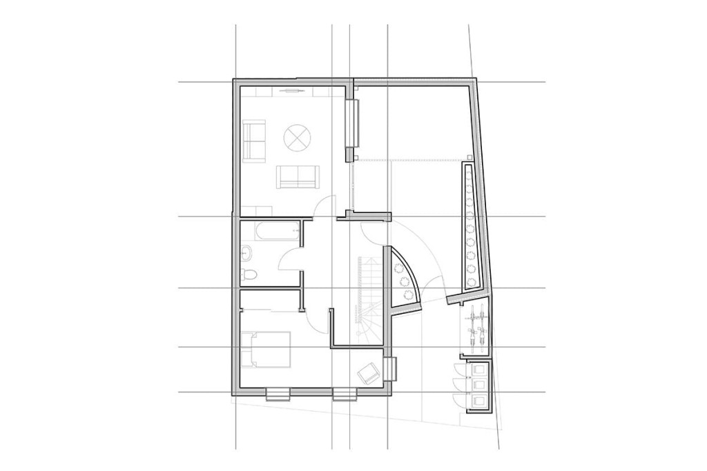 Architectural designer's proposal of a grey and black scaled floor plan to have the ground floor include a duo cycle storage, a private and gated entrance with a small green space to the front door, main family living room and a large l-shaped bedroom with a bathroom