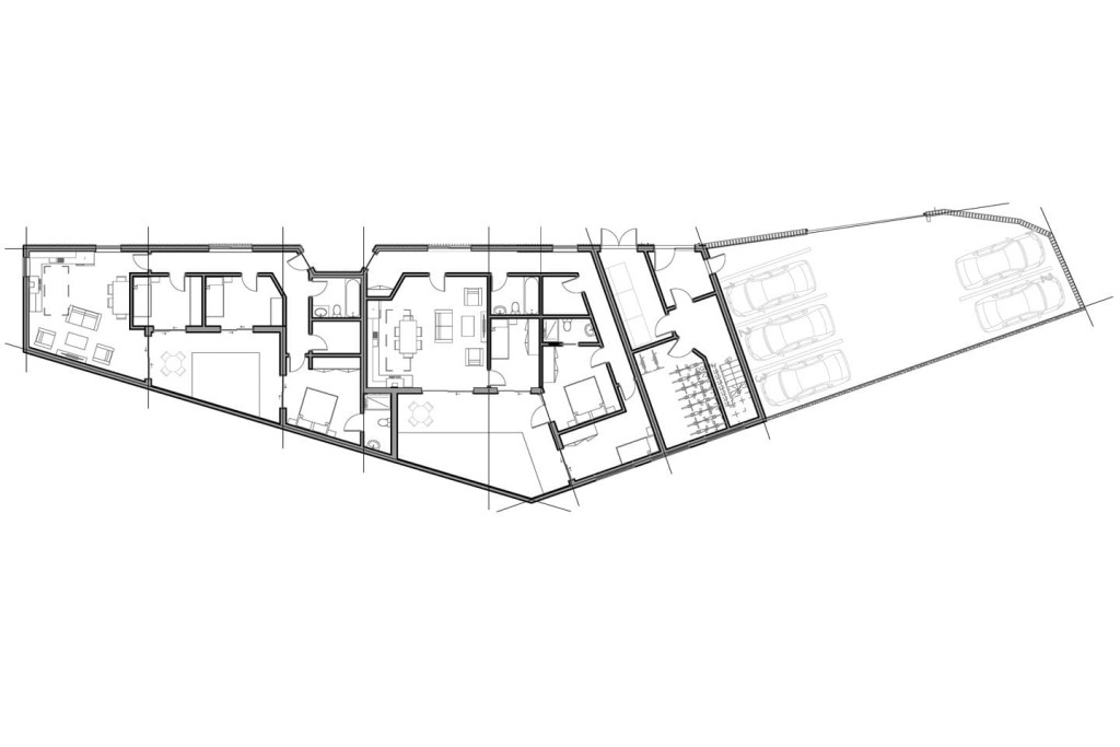 RIBA chartered architect's proposed floor plans for the ground floor to contain five parking bays in a private and closed parking, cycle storage to contain 10 bicycles and two three-bedroom and two bathroom apartment units with very spacious living room spaces.