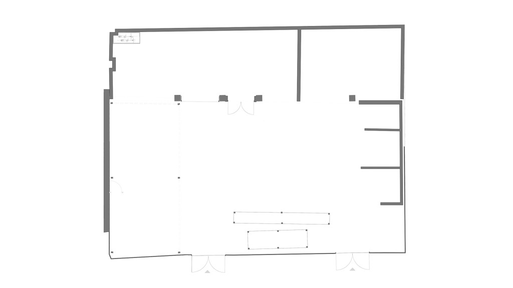 Architectural floor plan of an existing ground floor layout for a building project. The plan shows the spatial arrangement, including walls, doorways, and room divisions. The design features a large open area in the center, surrounded by several smaller rooms and entry points, highlighting the current configuration before any renovations or extensions.