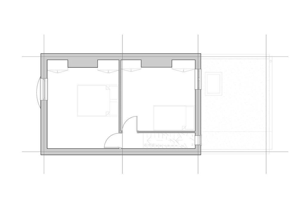 Simplified architectural plan the existing first floor for a small home extension, illustrating a top-down view of two bedrooms suitable for planning permission application.