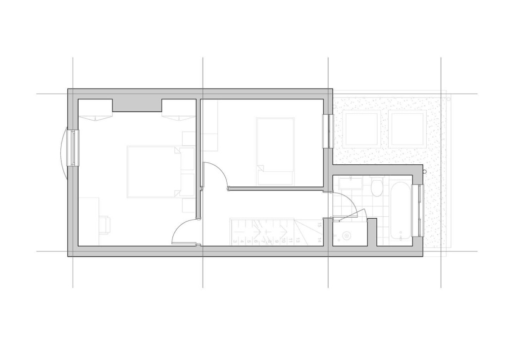 Architectural plan of the proposed first-floor residential extension with clear demarcation of the two bedrooms and bathroom areas, complete with furniture layout and design details, perfect for home renovation and design planning.