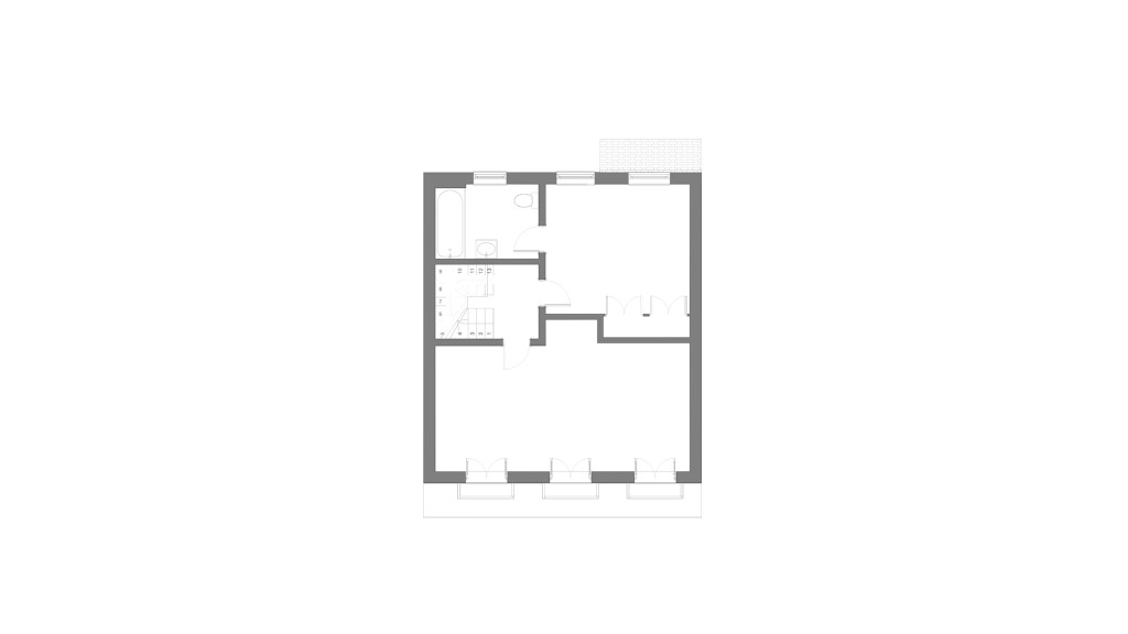 Existing first floor plan for a luxury Belgravia mews house, showcasing the layout prior to renovation. The plan includes multiple rooms, a bathroom, and staircase. Key features are the compartmentalised rooms and inefficient use of space, highlighting the need for a redesign.