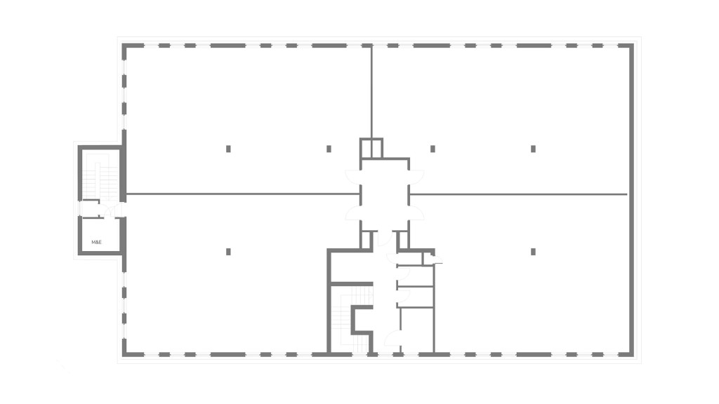 This detailed existing loft plan architectural drawing highlights the expansive, undeveloped space, with structural elements and partitioned sections clearly marked. The plan is a key reference for the upcoming transformation project by Urbanist Architecture, aiming to convert this office space into stylish, comfortable loft apartments. This conversion project aligns with modern urban living trends and emphasises efficient space utilisation, natural lighting, and contemporary design aesthetics.