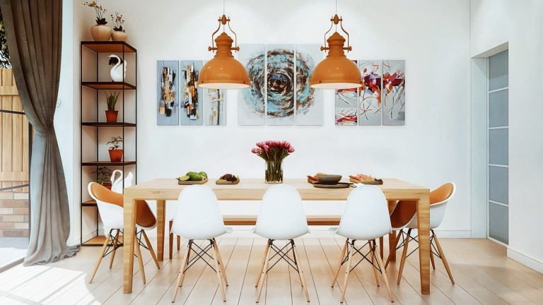 Light-filled dining room showcasing Scandinavian design with a wooden table, white chairs, and oversized pendant lamps, accented by abstract art and a sleek shelving unit with houseplants.