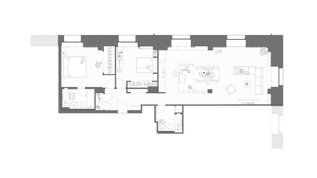 Proposed floor plan of a flat in a Grade II-listed gunpowder warehouse conversion on The Highway E1W. The redesigned layout by Urbanist Architecture includes an open-concept living area with a modern kitchen and dining space, optimised for better flow and functionality. The bedrooms are repositioned to maximise space, and the bathroom is updated with contemporary fixtures. This floor plan reflects the interior refurbishment aimed at blending modern design with the building's historic character, ensuring a stylish yet respectful renovation.